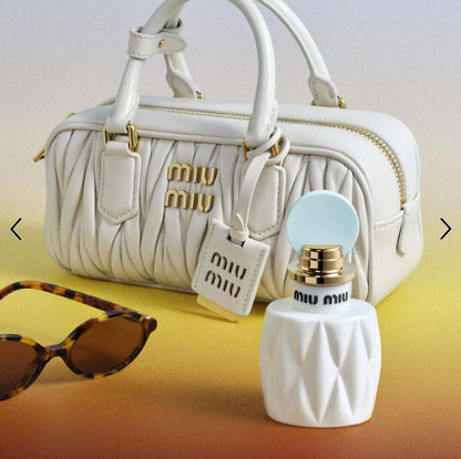 Miu Miu Fleur de Lait EDP Mini Spray – Warm Coconut & Floral Fragrance