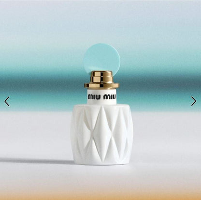Miu Miu Fleur de Lait EDP Mini Spray – Warm Coconut & Floral Fragrance